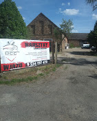 Wjazd na teren warsztatu OCC Olaf Car Clinic